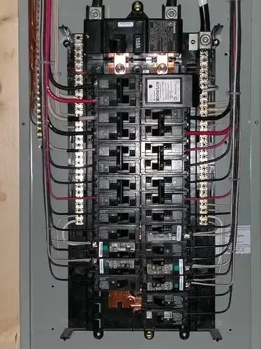 Residential electrical panel with circuit breakers and wiring